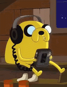 Jake listening to headphones and nodding