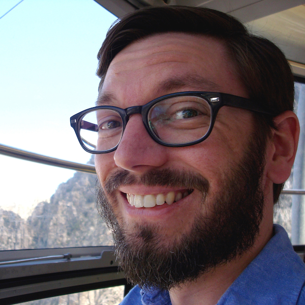 Ryan smiling in a friendly close-up